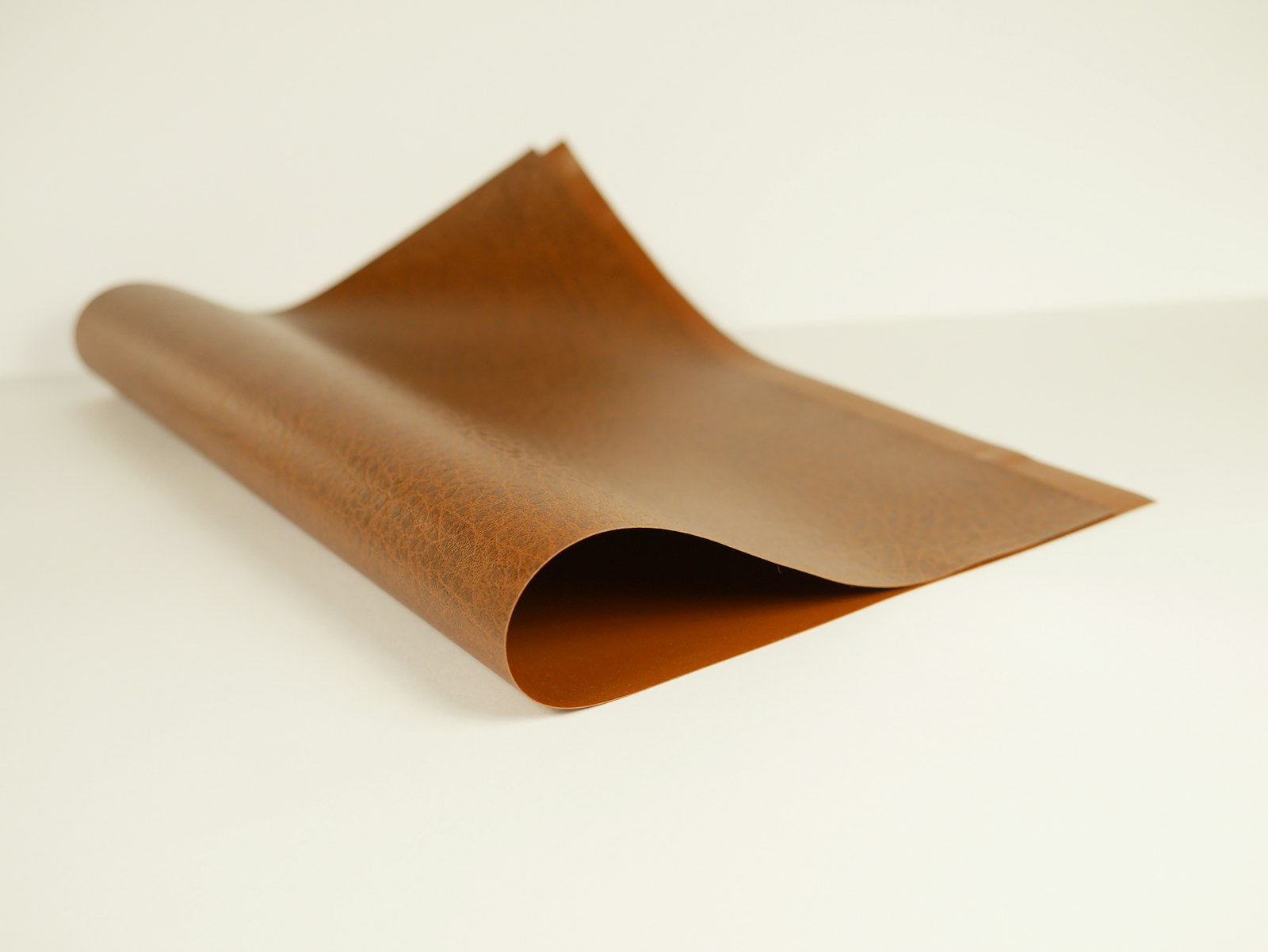 Leather hide on the workbench before cutting