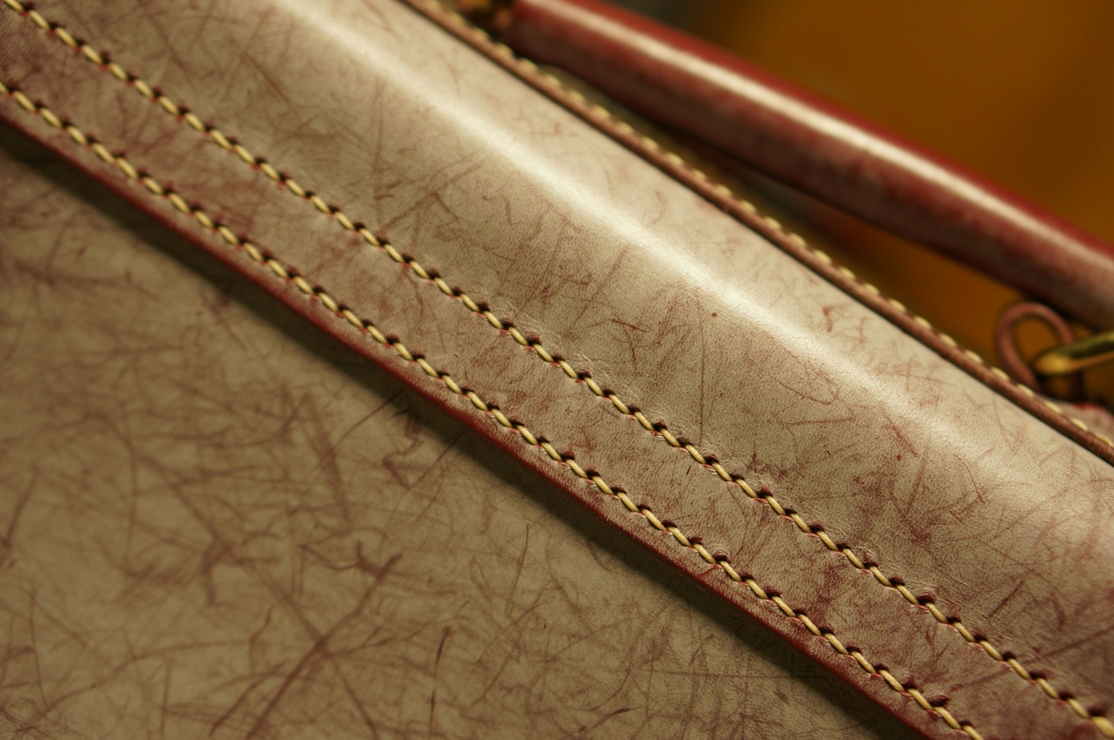 Contrast thread through a hand-stitched seam